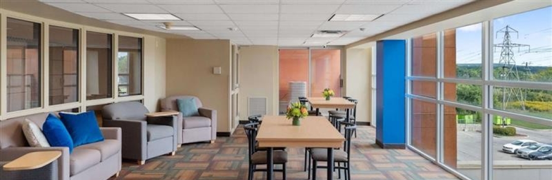 West Village Suites Cover Image